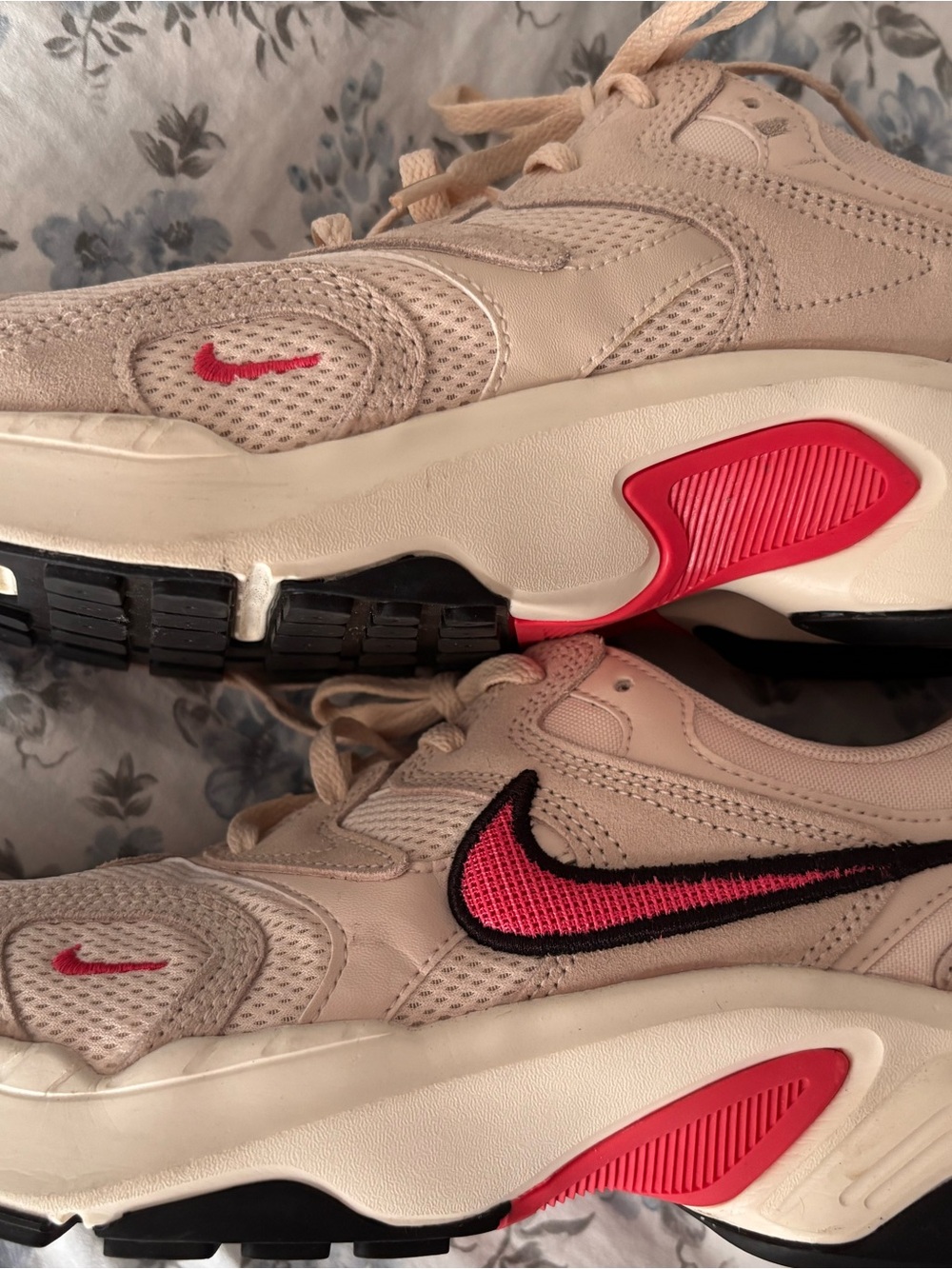 Nike Cream Sneakers with Pink and Black Swoosh Accents